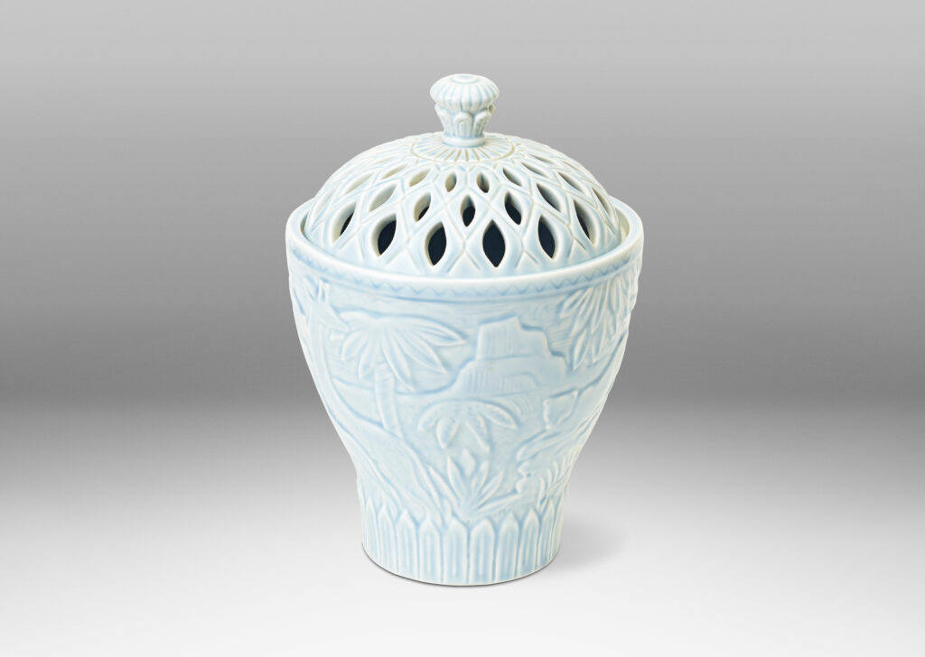 Gallery BAC Urn with perforated lid with relief depicting African savanna fauna and flora