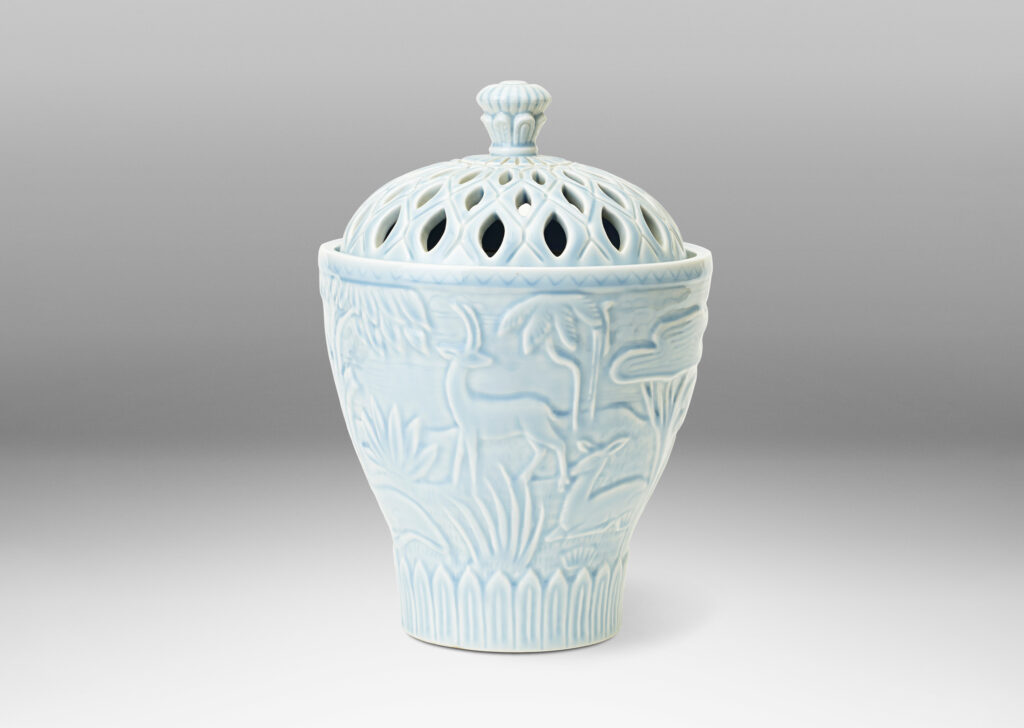 Gallery BAC Urn with perforated lid with relief depicting African savanna fauna and flora