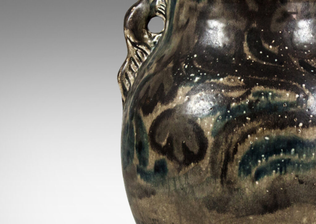 Gallery BAC globe body with wide patterned lip, handles in the form of beavers, and abstracted chestnut trees glazed on both side