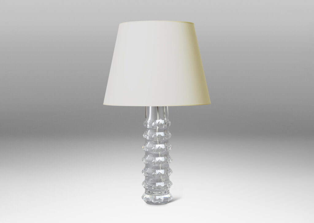 Gallery BAC cylindrical bases punctuated with notched raised bands to catch the light, crafted in cut crystal