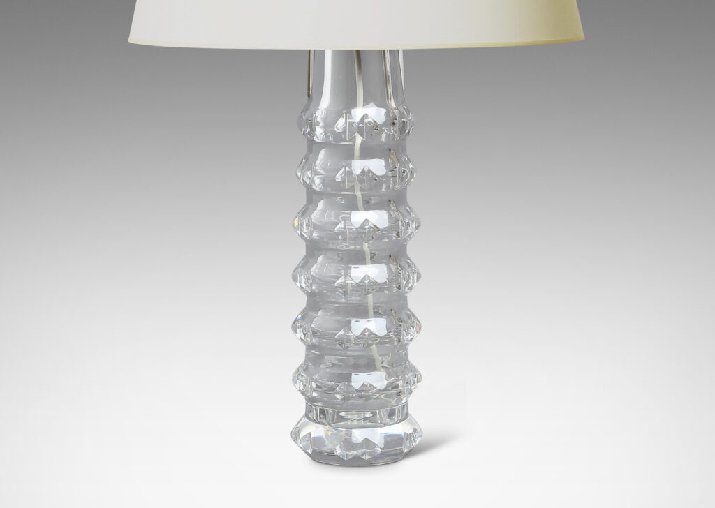 Gallery BAC cylindrical bases punctuated with notched raised bands to catch the light, crafted in cut crystal