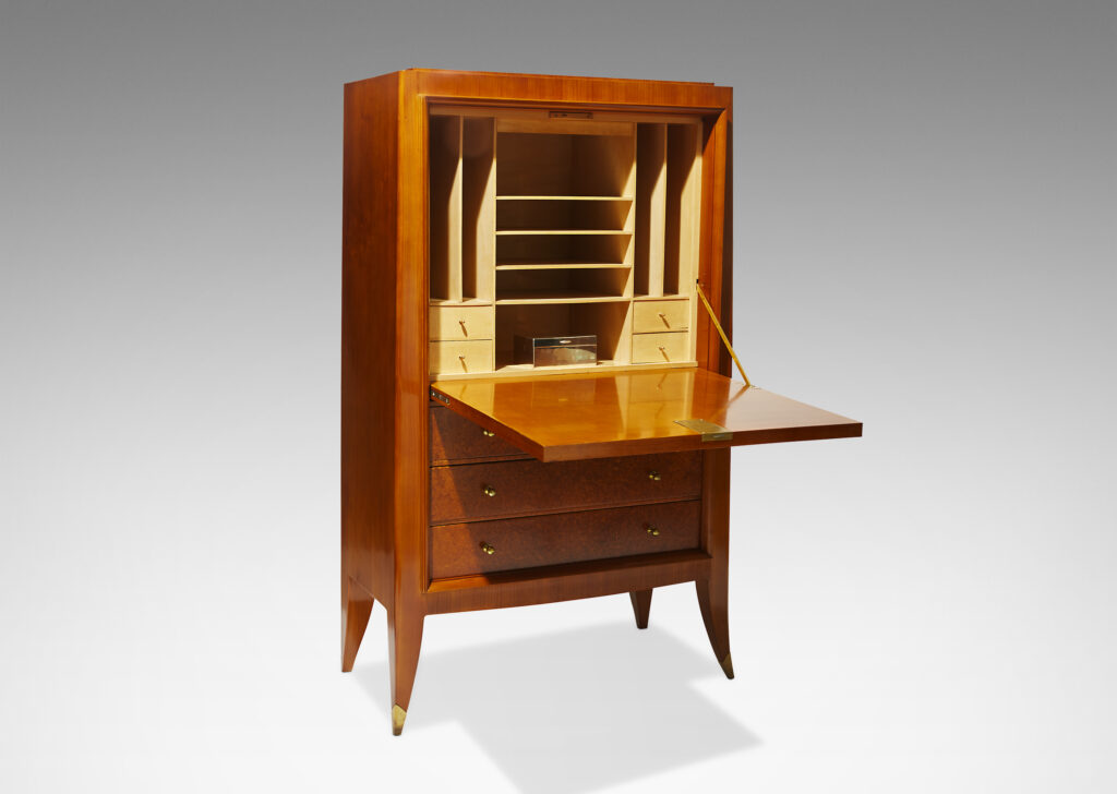 Gallery BAC secretaire with door opening down to form a writing surface and to reveal stationery storage, and three drawers below