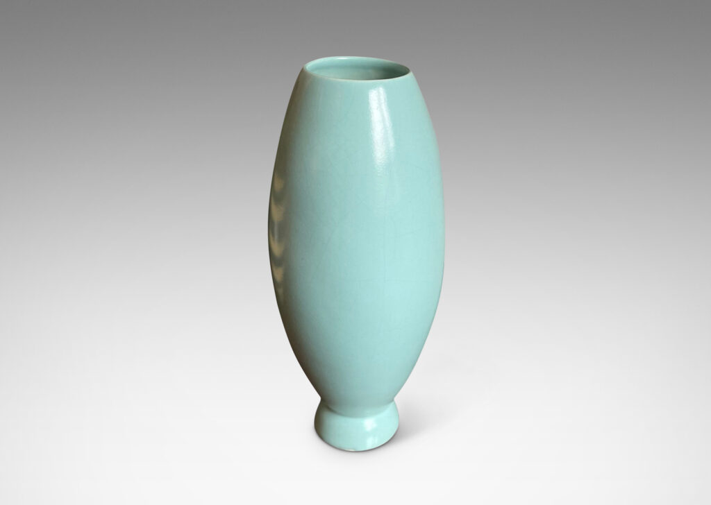 Gallery BAC parabolic cone form on a demi-spherical base crafted in ceramic with an eggshell finish baby blue glaze