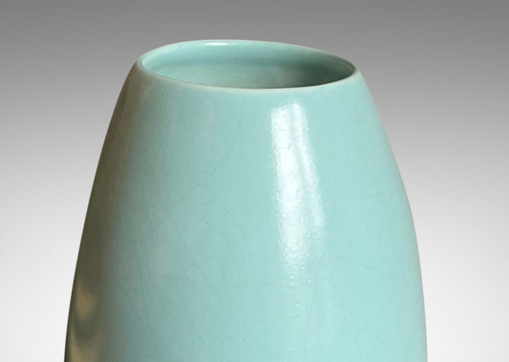 Gallery BAC parabolic cone form on a demi-spherical base crafted in ceramic with an eggshell finish baby blue glaze