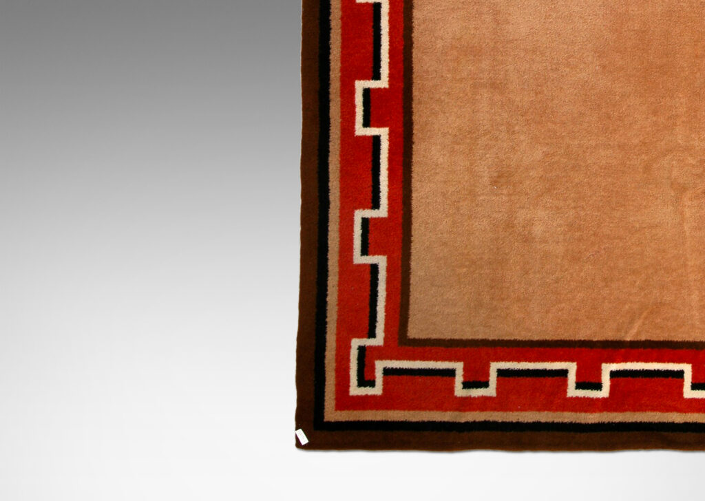 Gallery BAC double-sided pile with a camel brown field and red Greek meander border