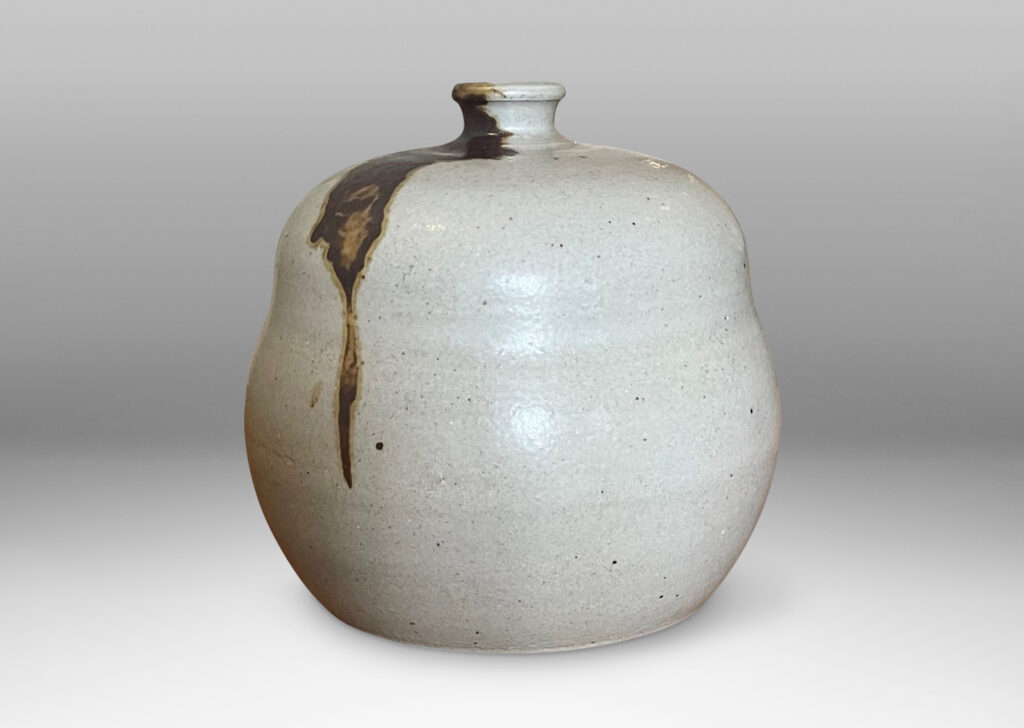 Gallery BAC double gourd form in pale gray with brown and purple accents; glazed stoneware