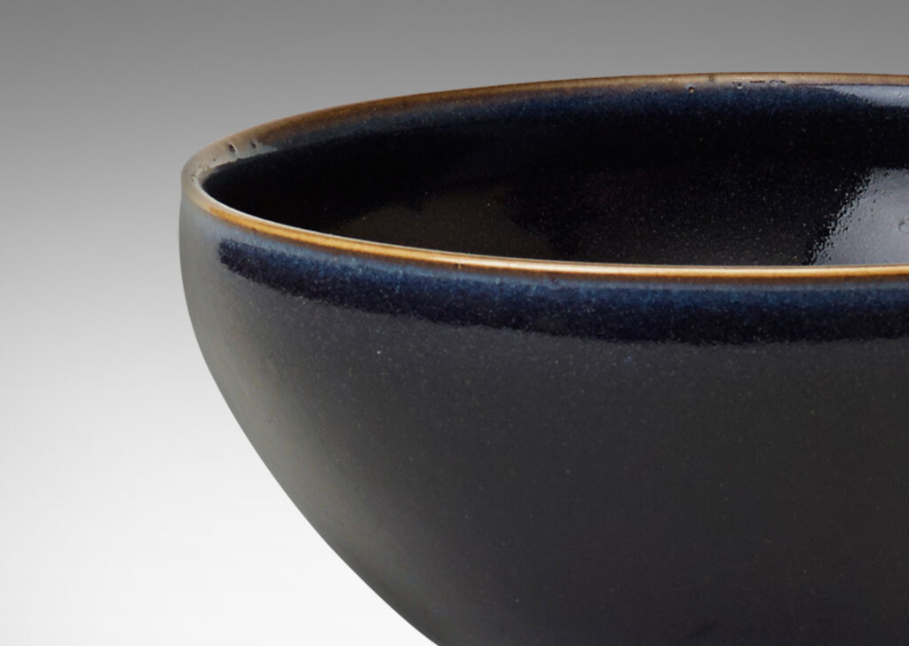 Gallery BAC stoneware with deep blue glaze revealing brown at edges