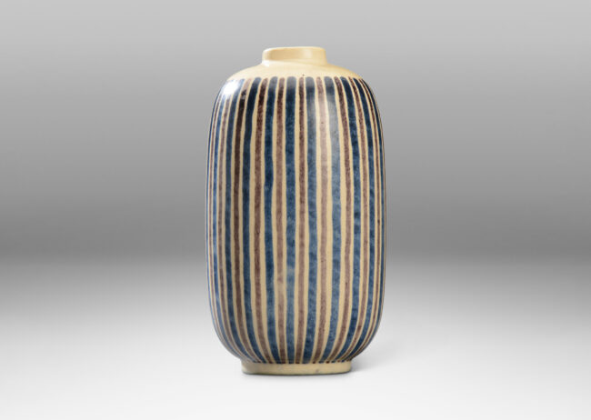 Gallery BAC stoneware glazed in ivory with alternating blue and brown striation