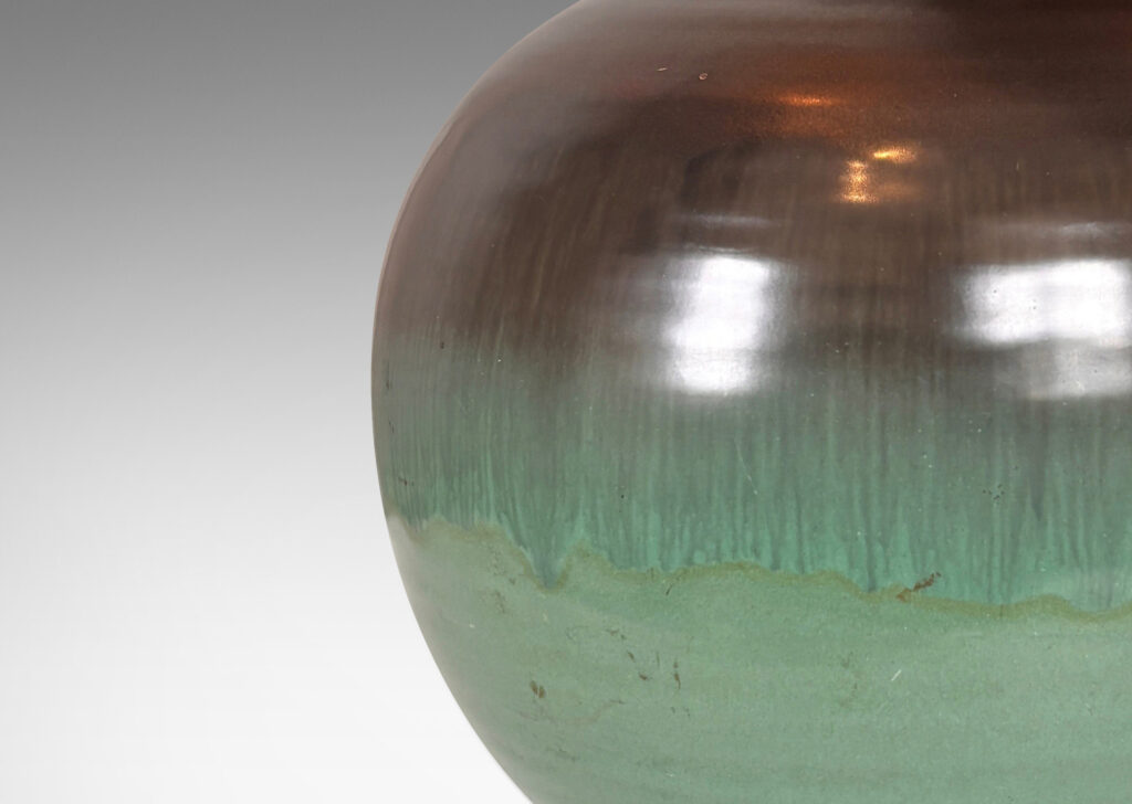 Gallery BAC globe form in blue-green and dark gray luster glazes