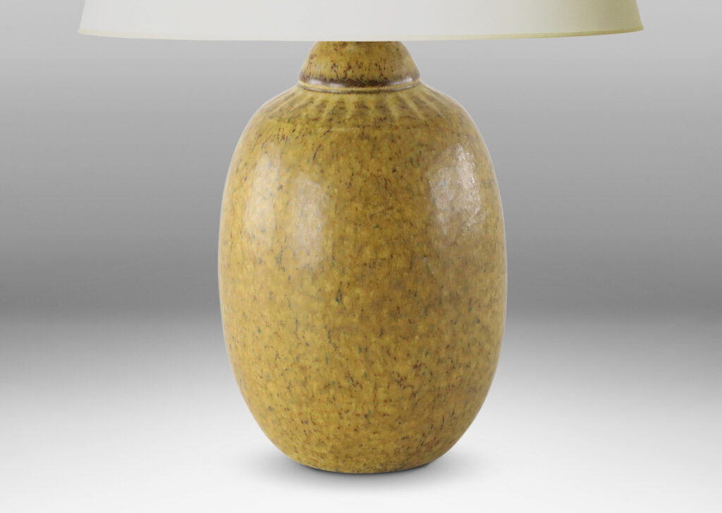 Gallery BAC ovoid form with radiating detail at neck and mottled sandy tan glaze