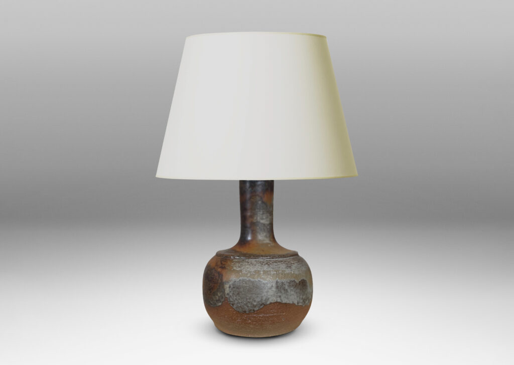 Gallery BAC low rounded forms and tall necks with a grog textured finish, partially glazed with petal-like strokes of gray-brown glaze