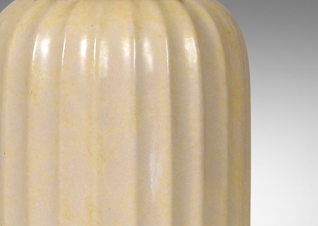 Gallery BAC ovoid form with vertical fluting in a sponged butter yellow-ivory glaze