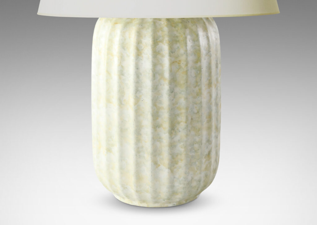 Gallery BAC straight-sided ovoid form with vertical fluting in a sponged pale green-cream glaze