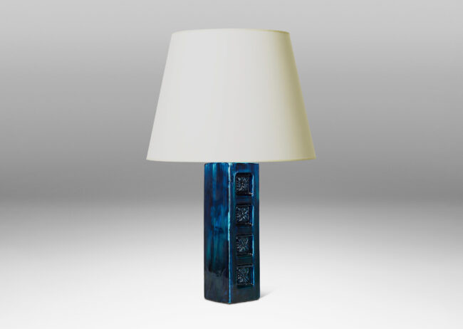 Gallery BAC square column form with impressed rosette motifs on one side and a saturated savoy blue glaze