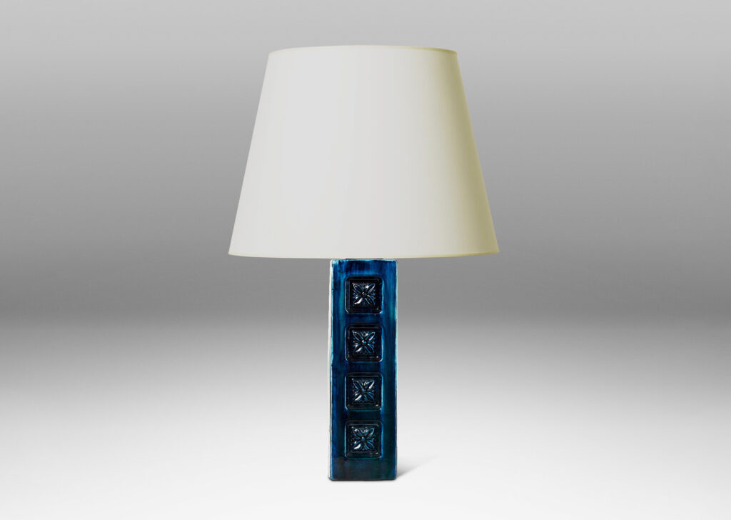 Gallery BAC square column form with impressed rosette motifs on one side and a saturated savoy blue glaze