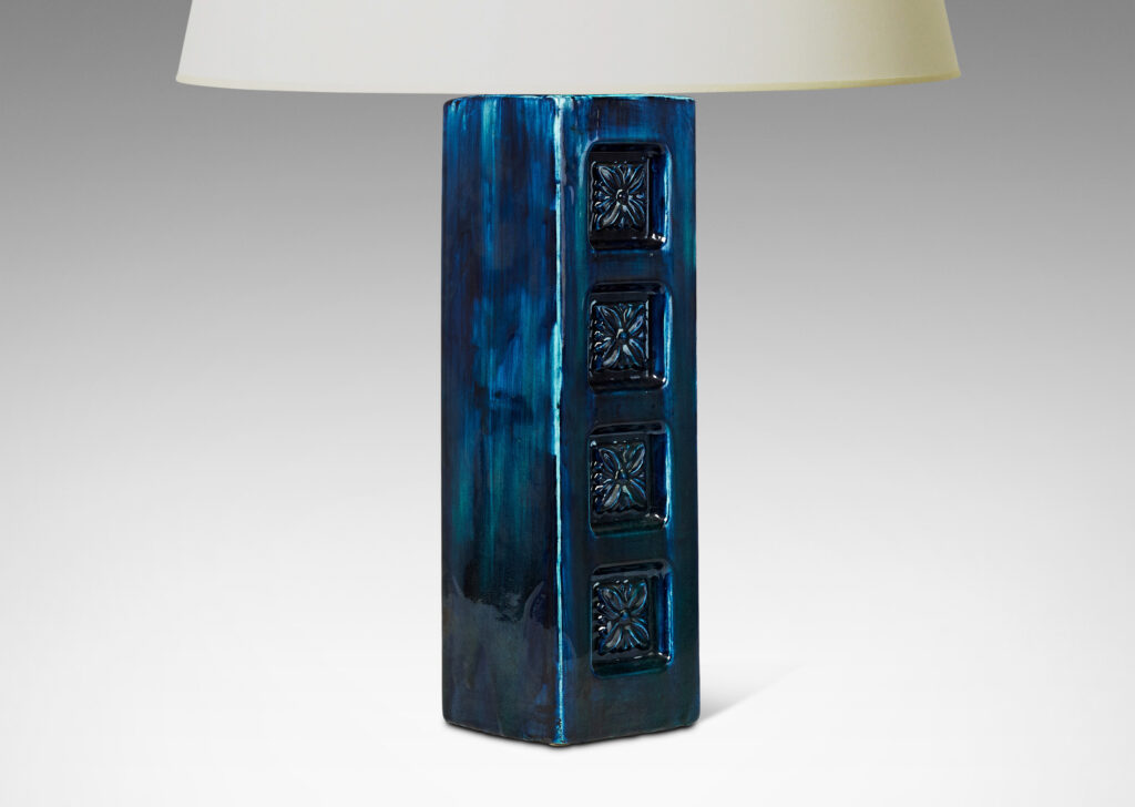 Gallery BAC square column form with impressed rosette motifs on one side and a saturated savoy blue glaze