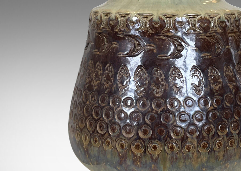 Gallery BAC organically modeled form with impressed circle and ogival motifs in tan and brown