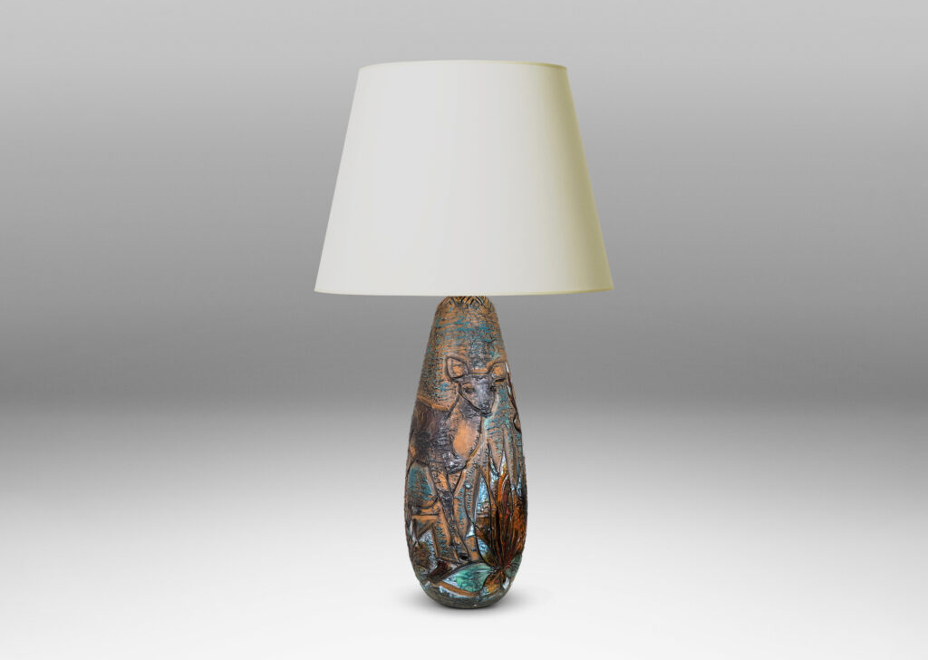 Gallery BAC tall ovoid form with carved depiction of a stag and deer with multicolor glaze