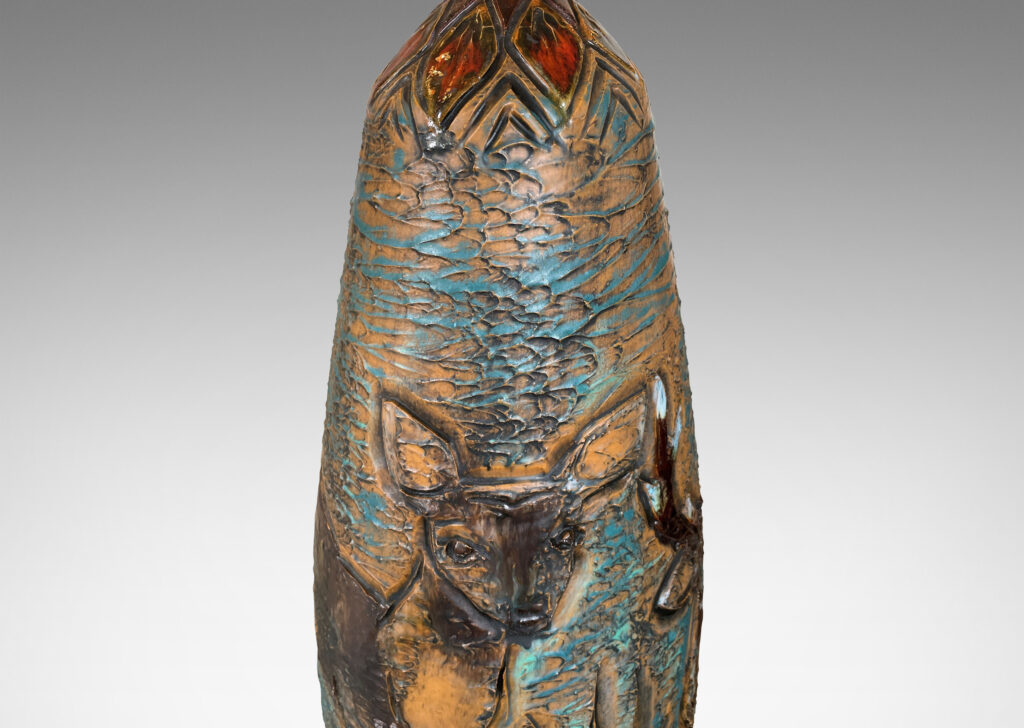 Gallery BAC tall ovoid form with carved depiction of a stag and deer with multicolor glaze