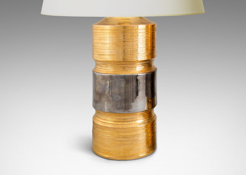 Gallery BAC coined column bases in gold and silver luster glazed earthenware