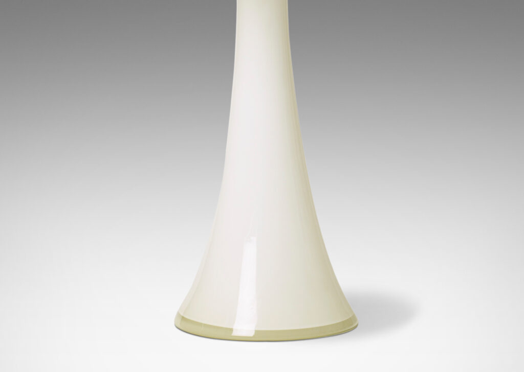 Gallery BAC flared column forms with convex sides; white and clear glass