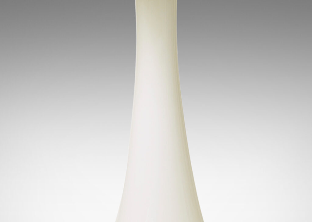 Gallery BAC flared column forms with convex sides; white and clear glass