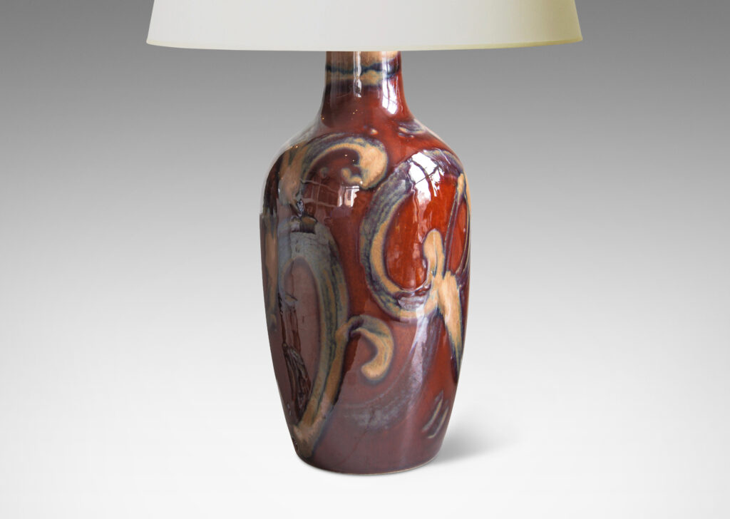 Gallery BAC vase form in a rich burnt sienna with scrolling pattern in pale taupe luster glaze