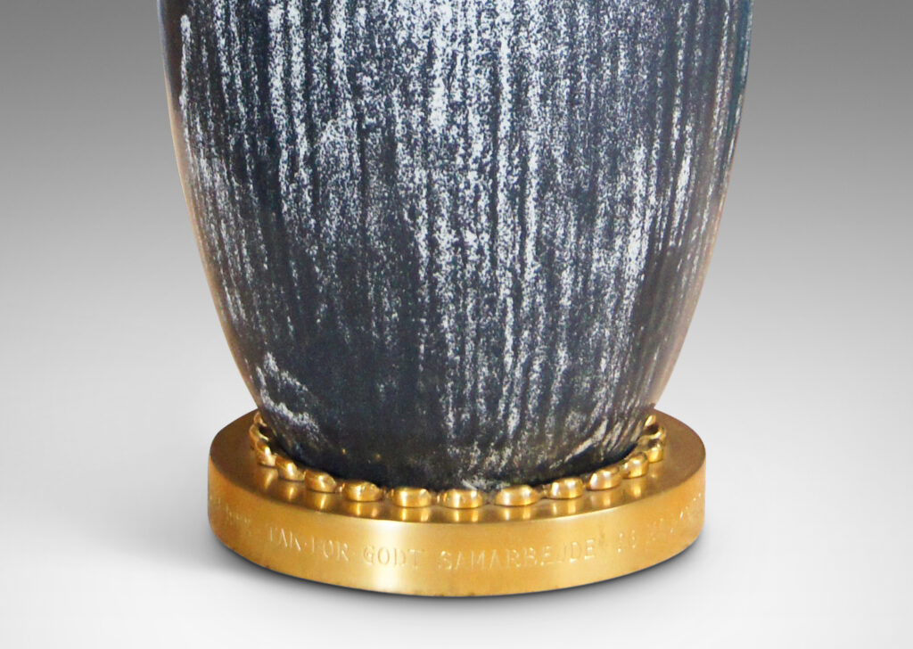 Gallery BAC classic vase form with organically modeled handles and carved texture, hand-crafted in earthenware with a white-black tin glaze