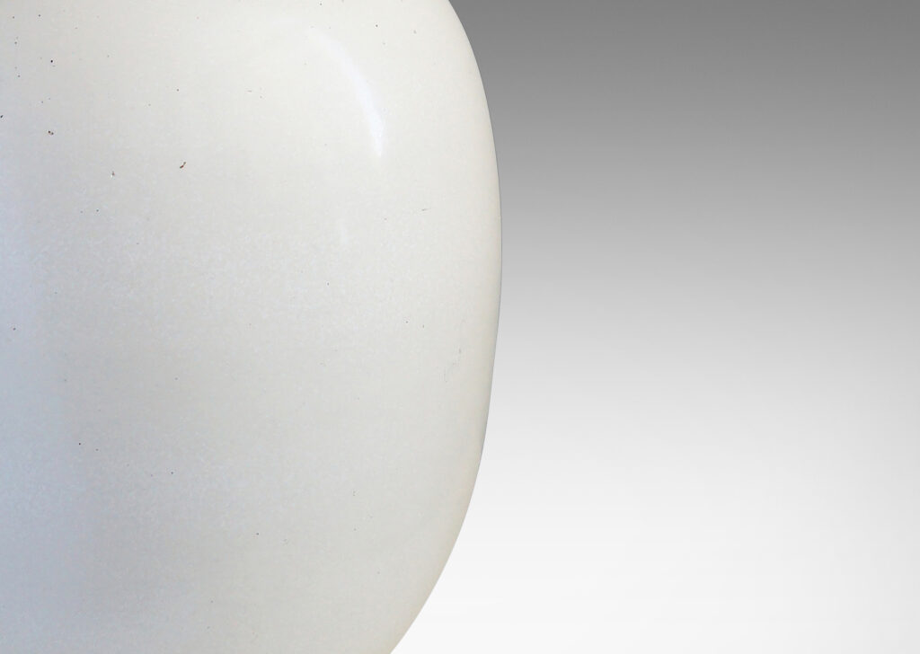 Gallery BAC tapered ovoid form in off-white tones; glazed stoneware