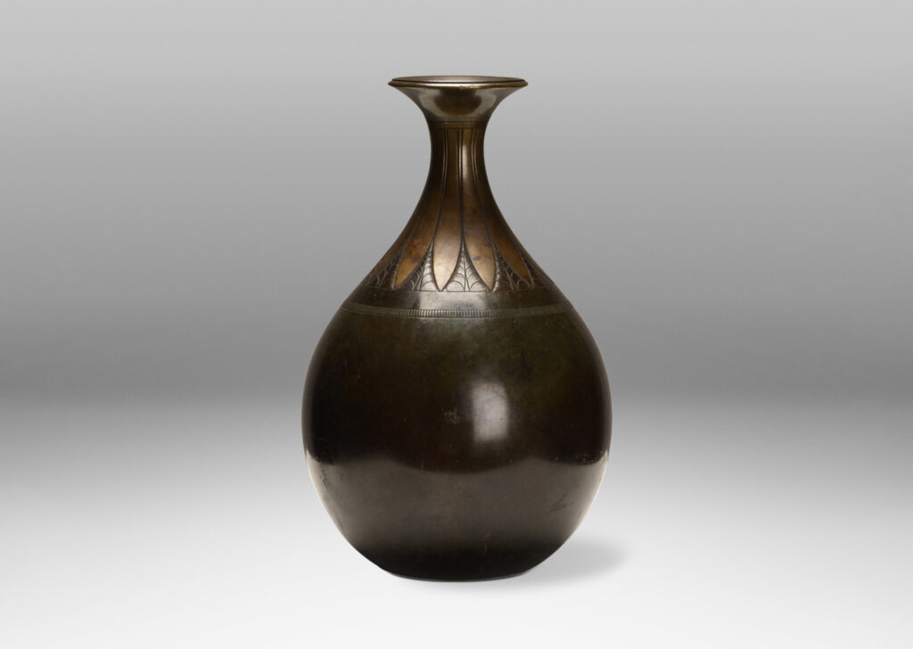 Gallery BAC bulbous form with outstretched mouth and engraved and lotus design