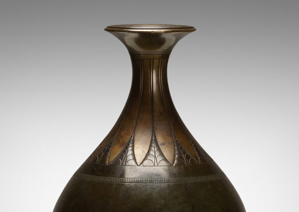 Gallery BAC bulbous form with outstretched mouth and engraved and lotus design