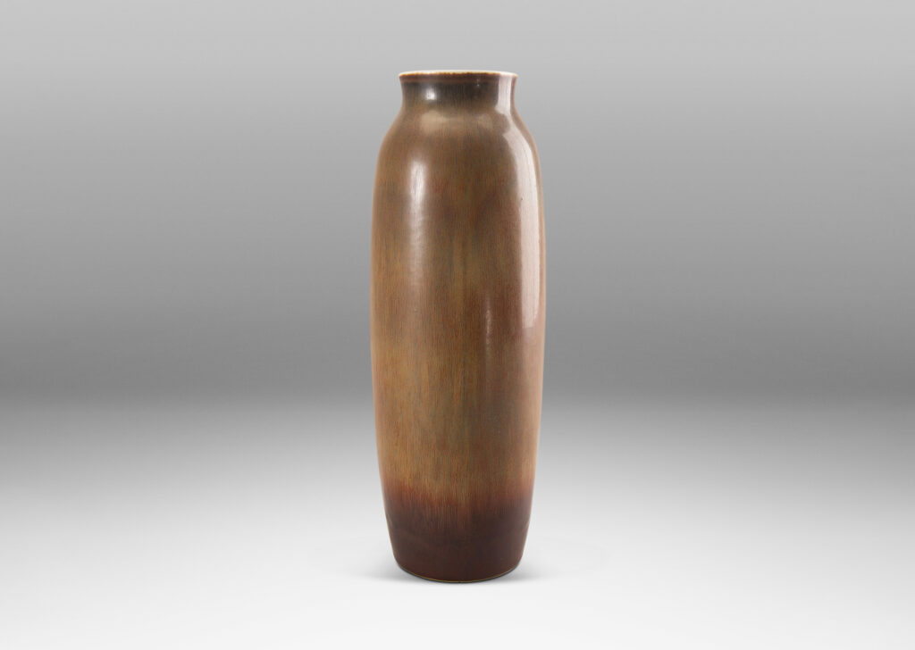 Gallery BAC sinuously modeled form with a raw umber and brown hare fur glaze