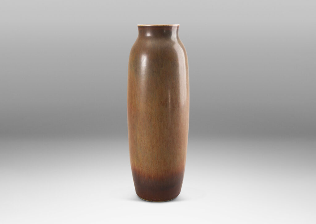 Gallery BAC sinuously modeled form with a raw umber and brown hare fur glaze