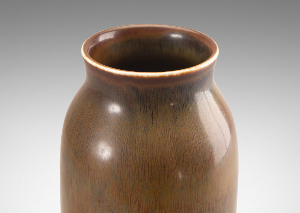 Gallery BAC sinuously modeled form with a raw umber and brown hare fur glaze