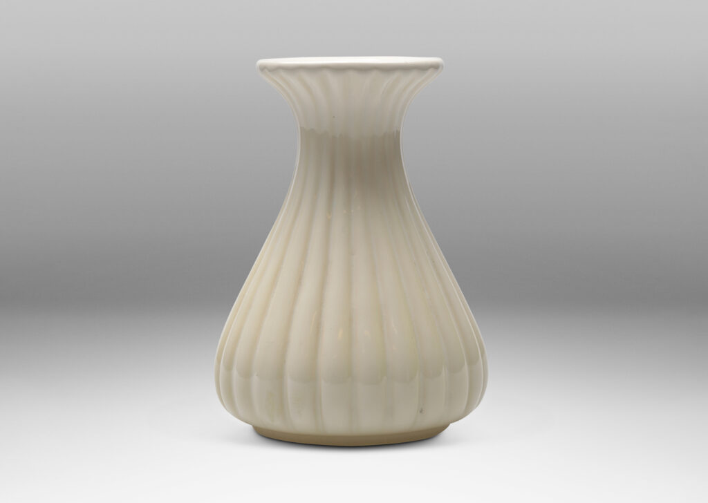 Gallery BAC reeded bulbous form with flared mouth in a bright gloss ivory glaze