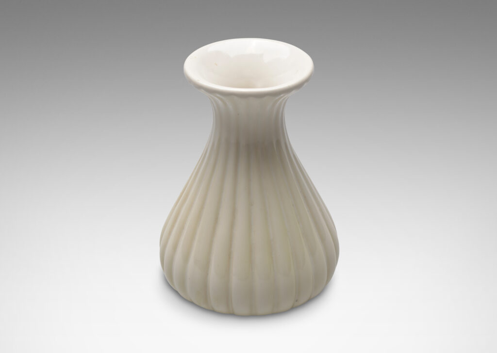 Gallery BAC reeded bulbous form with flared mouth in a bright gloss ivory glaze