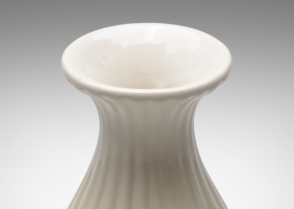 Gallery BAC reeded bulbous form with flared mouth in a bright gloss ivory glaze