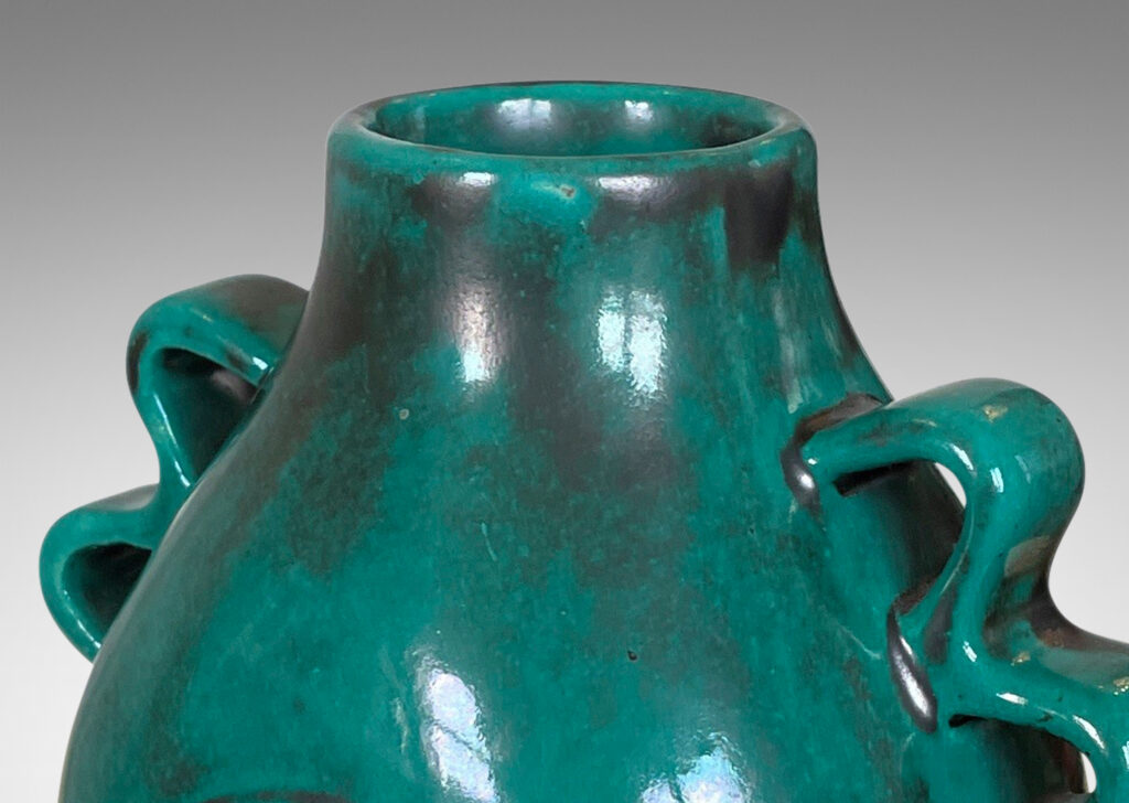 Gallery BAC bulbous form with wavy handles and bird motifs in deep teal-toned copper oxide glaze