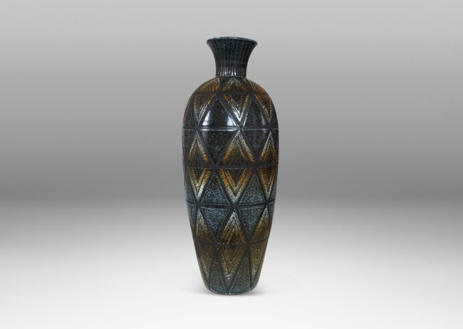 Gallery BAC tall slender tapered form with carved diamond pattern glazed in ethereally applied black and brown