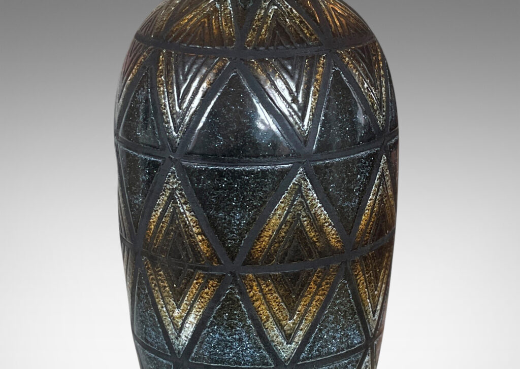 Gallery BAC tall slender tapered form with carved diamond pattern glazed in ethereally applied black and brown