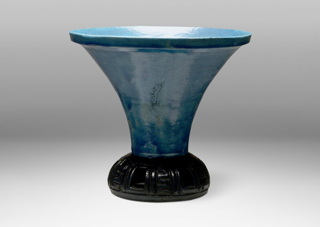 Gallery BAC openwork and carved base in blue-black, with sprouting trumpet form in craquel turquoise