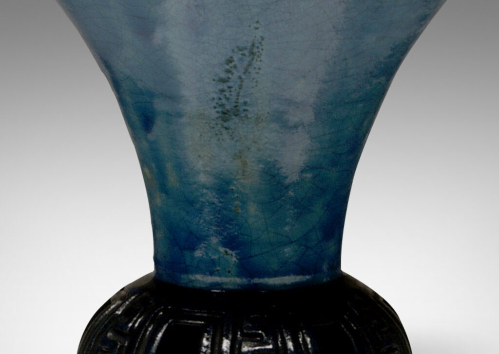 Gallery BAC openwork and carved base in blue-black, with sprouting trumpet form in craquel turquoise