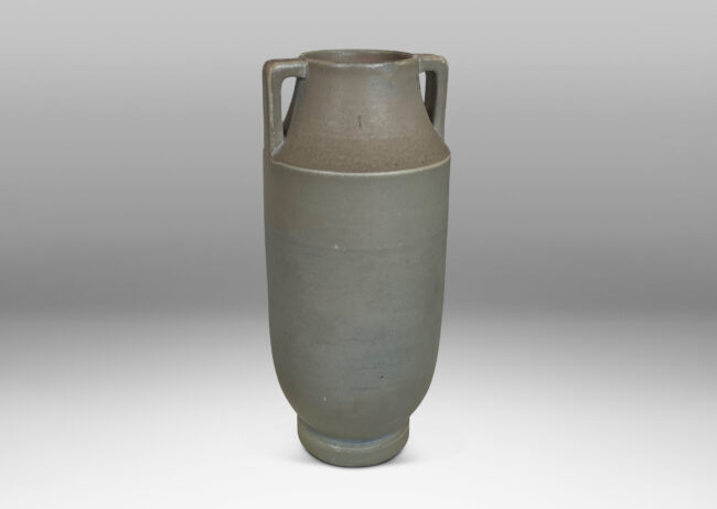 Gallery BAC tall attenuated cylindrical form with handles in a stone-evoking soft matte greenish-gray glaze