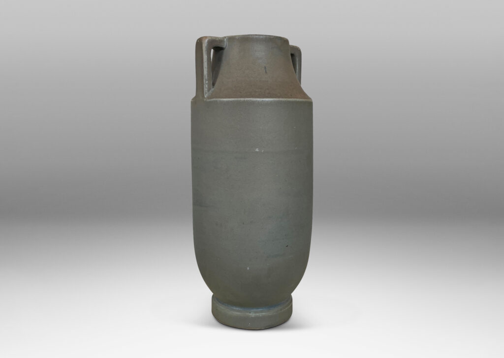 Gallery BAC tall attenuated cylindrical form with handles in a stone-evoking soft matte greenish-gray glaze