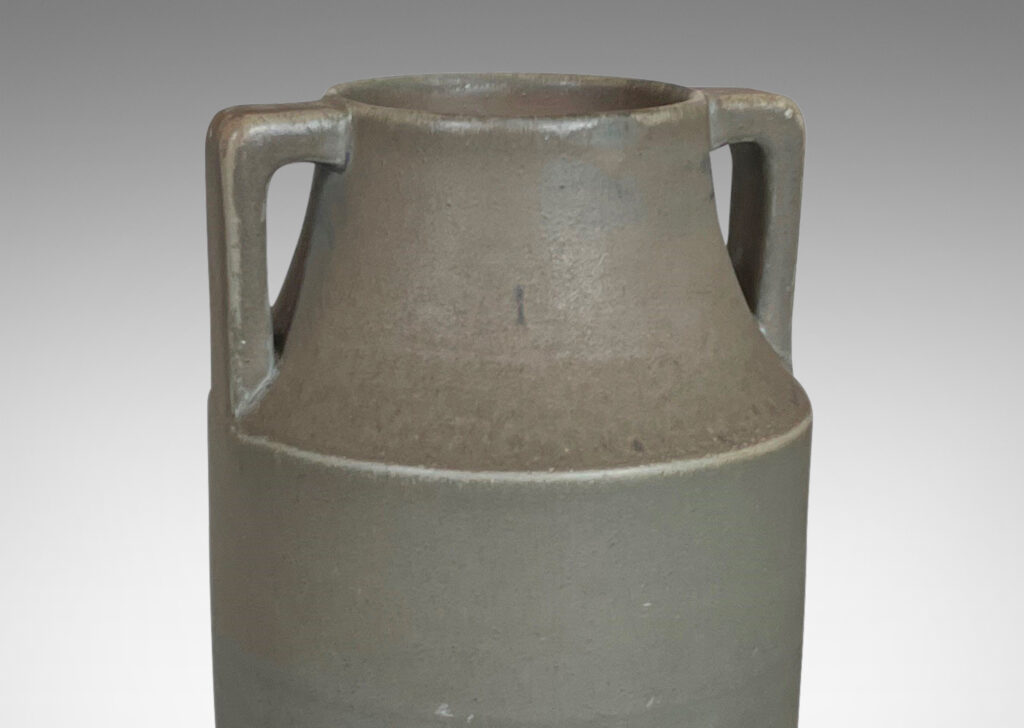 Gallery BAC tall attenuated cylindrical form with handles in a stone-evoking soft matte greenish-gray glaze