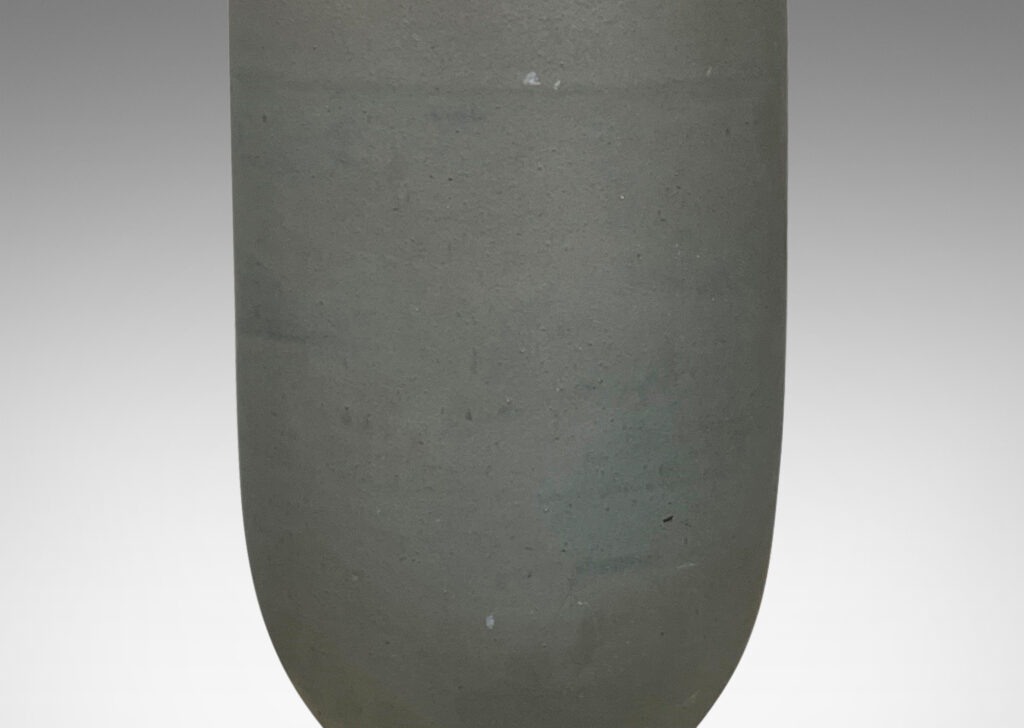 Gallery BAC tall attenuated cylindrical form with handles in a stone-evoking soft matte greenish-gray glaze