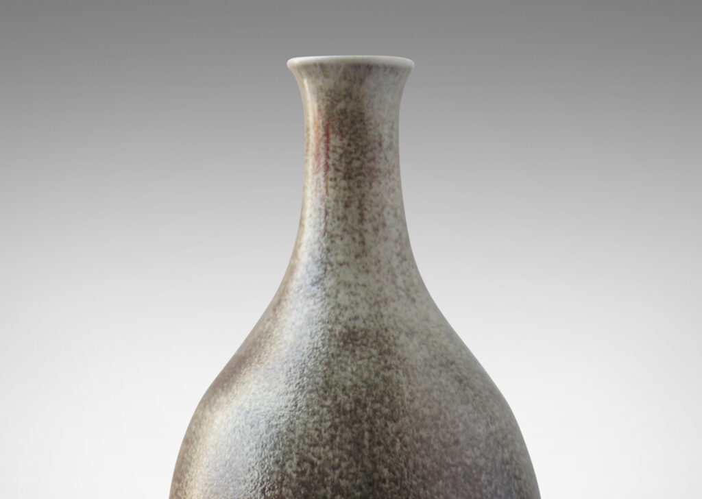 Gallery BAC organically modeled bottle form with a wonderful ombre pale gray and dark oxblood glaze