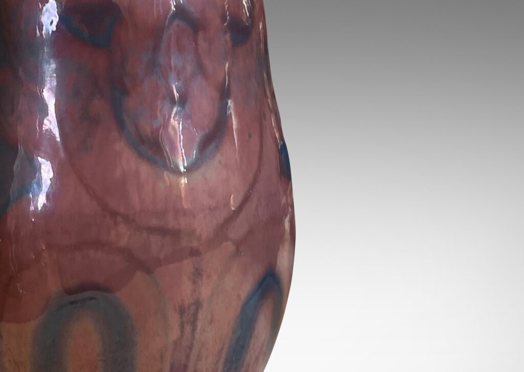 Gallery BAC undulating form with an abstract scrolling design in rose and gray luster glazes