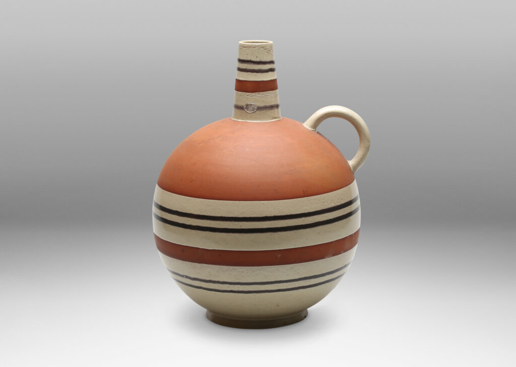 Gallery BAC spherical form with vertical spout and handle in terra cotta earthenware partially glazed in pale gray and brown stripes