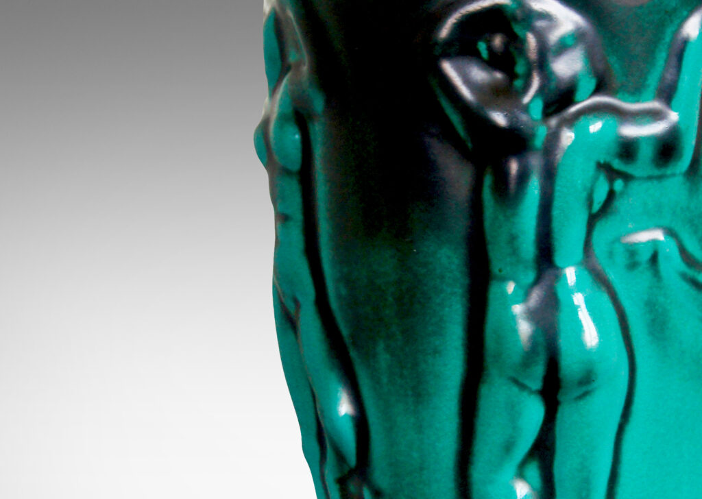 Gallery BAC ceramic with a blue-green copper oxide glaze that adds a nice sense of tonal depth to the athletic ladies